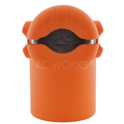 AC Works brand orange, compact, electrical adapter